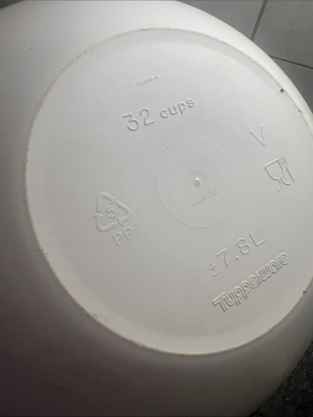 That’s a Bowl Tupperware Mixing Bowl with Blue Lid - White Bowl. 32 cup.
